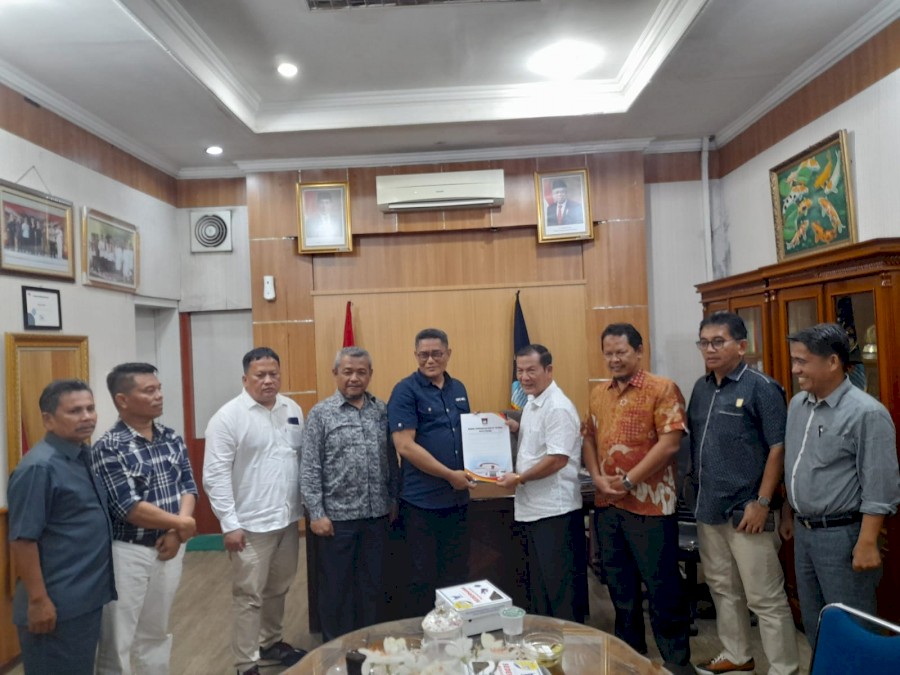 a penguin robot talking with a human