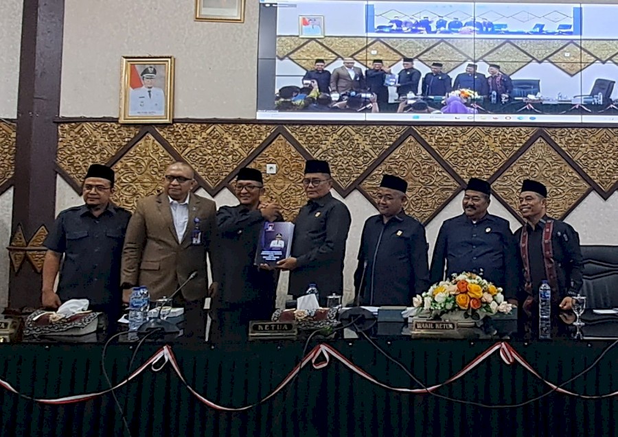 a penguin robot talking with a human